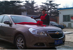 超前涂料獎勵員工轎車，真石漆生產(chǎn)廠家！